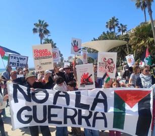 اوقفوا العدوان الصهيو-أمريكي مسيرة تضامنية في إسبانيا دعمًا لفلسطين وإيران