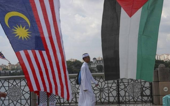 متظاهر داعمة لفلسطين في ماليزيا