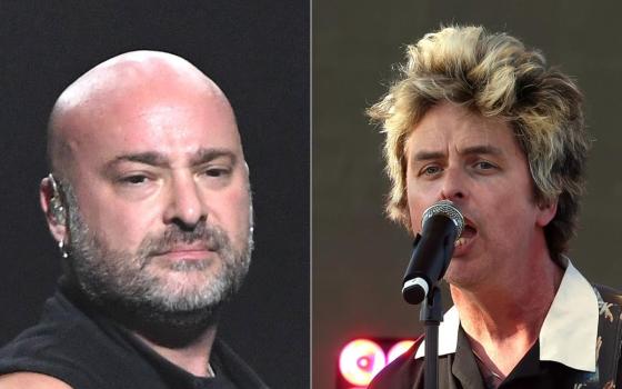 لتضامنه مع أطفال فلسطين.. عضو فرقة "ديستربد" يهاجم مغني "غرين داي"