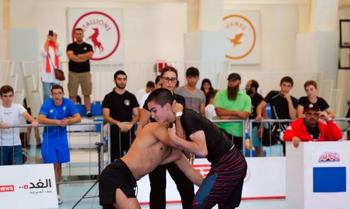 تغريدة ‏تجمع اتحرّك حول مشاركة الاحتلال في بطولة العالم للمصارعة