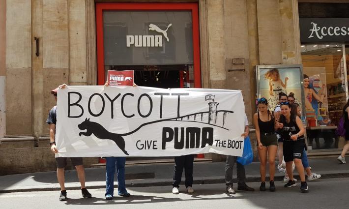 نشطاء يشاركون في اليوم العالمي ضد بوما في روما